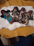 Faceless Dolls - by Wandering Buffalo