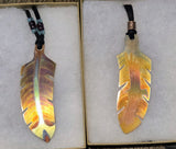 Copper feather pendant necklaces; by Wesley Havill