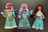 Faceless Dolls - dress with wooden medallion; by Wandering Buffalo