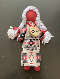 Faceless Dolls - dress with wooden medallion; by Wandering Buffalo