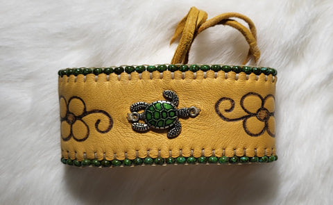Beaded Hide Bracelets; by Caroline Lackey